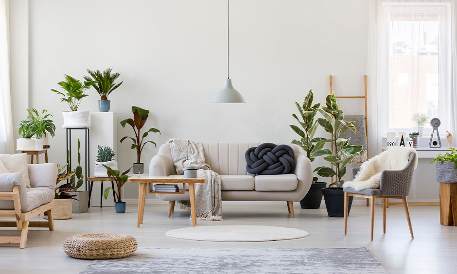 A picture of a room with white themed furniture and walls.