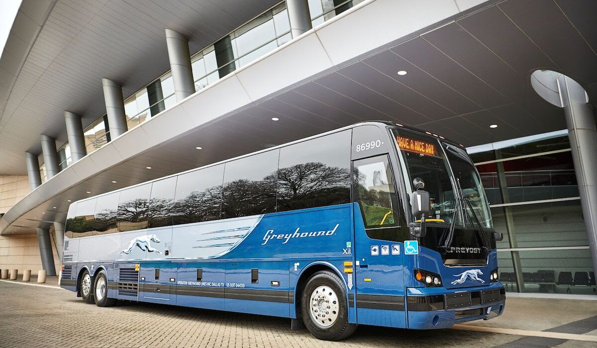 A Greyhound bus waiting for its passengers.